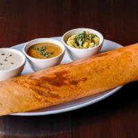 Masala Dosa · Thin crepes made with homemade rice and lentil flour fermented overnight. Filled with season...