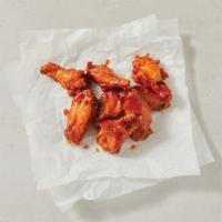 Traditional Bone-In · Don’t fix what ain’t broke. Classic, juicy bone-in wings served perfectly crispy and tossed ...