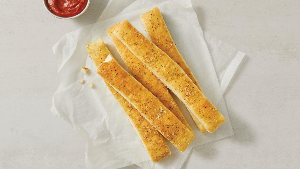 Cheese Sticks · Fresh, oven-baked dough smothered with cheese and sprinkled with Italian seasoning. Served with marinara.