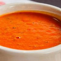 Creamy Tomato · Creamy Tomato Soup, Fresh Garlic & Basil