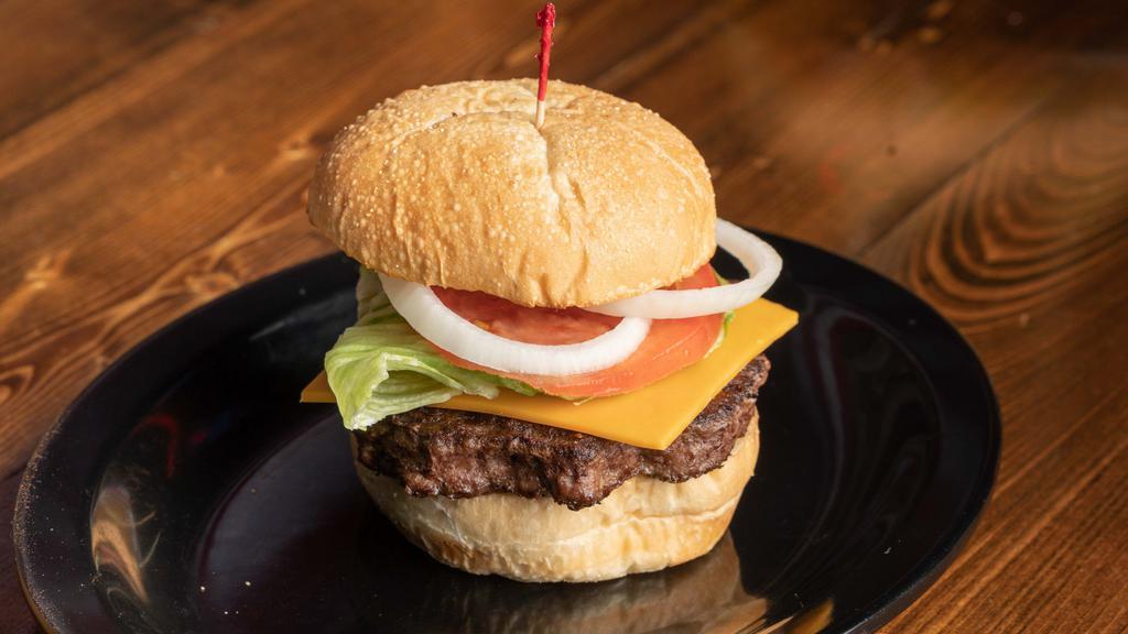 The All American Burger · Lettuce, tomato, onion, pickle & American cheese, side of mayo.