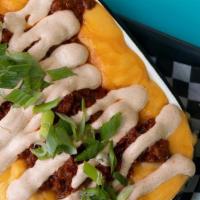 Welcome To Chili'S · Baked creamy mac & cheese topped with our house-made beef chili, seasoned sour cream and fre...