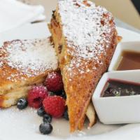 Downtown Monte Cristo · Roast turkey, Black Forest ham, Gruyère, dipped in an egg custard batter and deep-fried, fre...