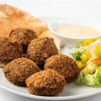 26) Falafel Plate · Six pieces. Vegetable patties made from chick peas, fava beans, and spices. Served with humm...
