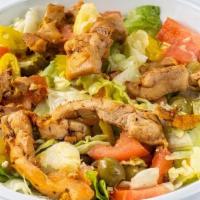 30) Greek Salad W/ Chicken · Grilled tender Chicken Breast served with Crispy Romaine, tomato, cucumber, red onion, olive...
