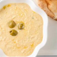 Hummus · A blend of chickpeas, tahina, lemon juice, and garlic
