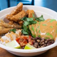 Southwest Bowl · Fried 'chicken', Black beans, Roasted baby corn,
Chopped roasted red pepper, Avocado, on a b...