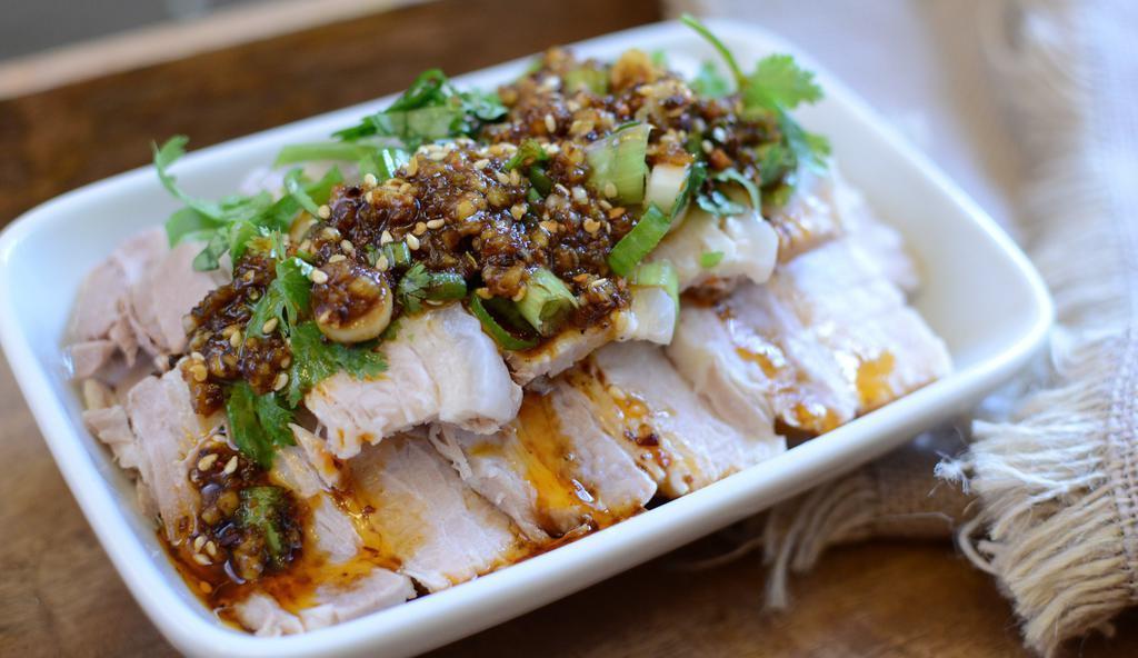 Slice Pork With Garlic Sauce · Spicy. Boiled pork slice topped with signature spicy garlic sauce and scallion. Famous Sichuan style side dish.