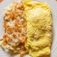 Western Omelette · Filled with ham, onions, green peppers, and smothered with American cheese.