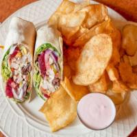 Greek Chicken Wrap · Mixed greens, tomatoes, feta cheese, pepperoni, beets, red onions, Greek olives and a side o...