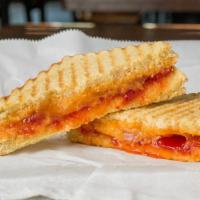 Grilled Cheese & Jelly · Your choice of American or sharp cheddar cheese and any of our craft jams or jellies, all me...