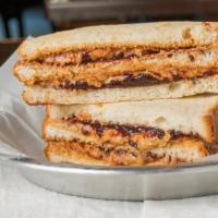 Double Decker · Two layers of fresh Peanut Butter, and two layers of jelly or jam between THREE layers of ou...
