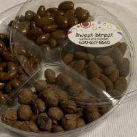 Milk Chocolate Nuts · almonds, cashews, double dipped peanuts and pecans.
 *substitutions may be made based on ava...