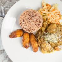 Curry Chicken Dinner · Tender pieces of chicken marinated in Jamaican curry and spices. Absolutely delicious with w...