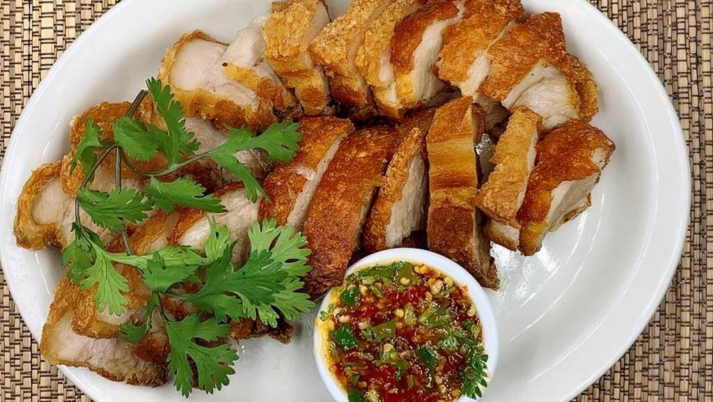Crispy Pork Belly · Marinated and slow cooked pork belly served with Thai salsa.