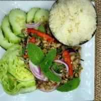 Laab Salad · Minced meat with onions, cilantro, chili, lime and roasted rice powder; served with cucumber...