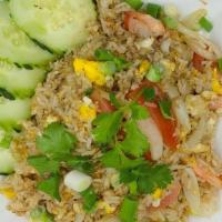 Thai Style Fried Rice · Rice fried with egg, onion, tomato and cilantro. Can be made GF or V upon request.