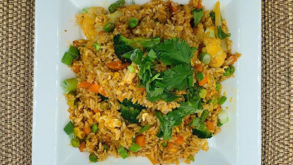 Sriracha Fried Rice · Rice fried with egg, onion, sweet peas, carrots, cauliflowers, broccoli, cilantro and Sriracha sauce. Can be made GF or V upon request.