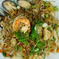 Amazing Thai Fried Rice · Rice fried with pineapple, egg, onion, bean sprout, sweet peas, chicken, pork, beef, shrimp,...