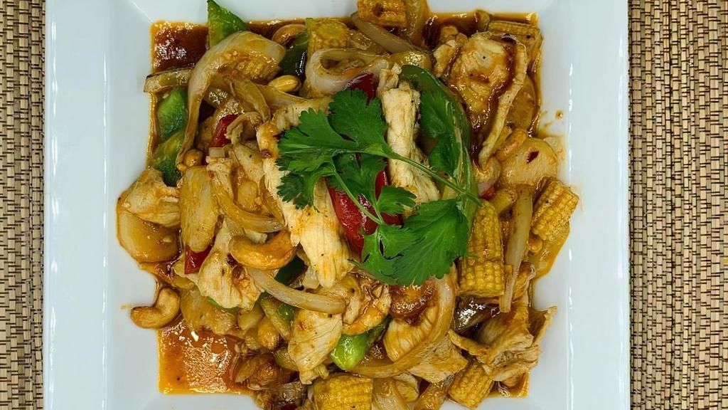 Cashew Stir Fry · Cashews, baby corn, water chestnuts, onion, and bell peppers with Thai chili paste served with rice. . Can be made GF or V upon request.