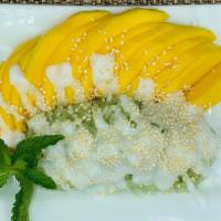 Mango Sticky Rice · Sweet coconut milk sticky rice with fresh mango, sprinkled with sesame seeds. . Dish is GF &...