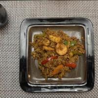 Kow Pad King Yellow Curry · Fried rice with egg, pineapple, carrots, cashews, tomatoes, bell peppers, and yellow curry p...