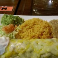 Beef Burrito · One flour tortilla filled with beef and topped with salsa verde and melted cheese