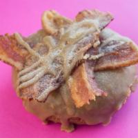 The Dude Goo · Maple cinnamon cake donut with a maple glaze, topped with strips of bacon.