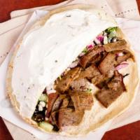Beef Shawarma (Gyros) · Marinated beef or lamb slices with tomatoes, onion, pickles, and Tahini sauce.

Consumption ...