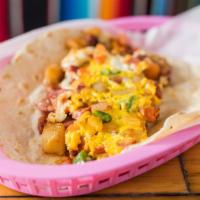 Chorizo, Papas Y Huevo Breakfast Taco · House chorizo, crispy potatoes, scrambled eggs and pico de gallo. Served on flour tortilla.