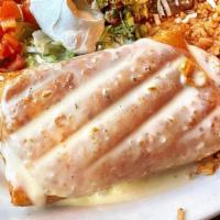 Chimichangas Mazatlan · Two deep-fried flour tortillas stuffed with imitation crabmeat and grilled shrimp covered wi...
