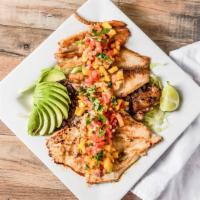 Fiesta Trio · Grilled chicken, rib-eye steak and tilapia fillet topped with a mango avocado salsa.