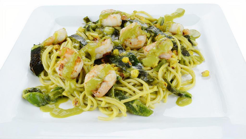 Roasted Poblano Pasta · Grilled shrimp or chicken sautéed in a buttery sauce, garnished with roasted poblano pepper strips and roasted corn, covered with grandma's poblano pepper cream sauce over spaghetti pasta.