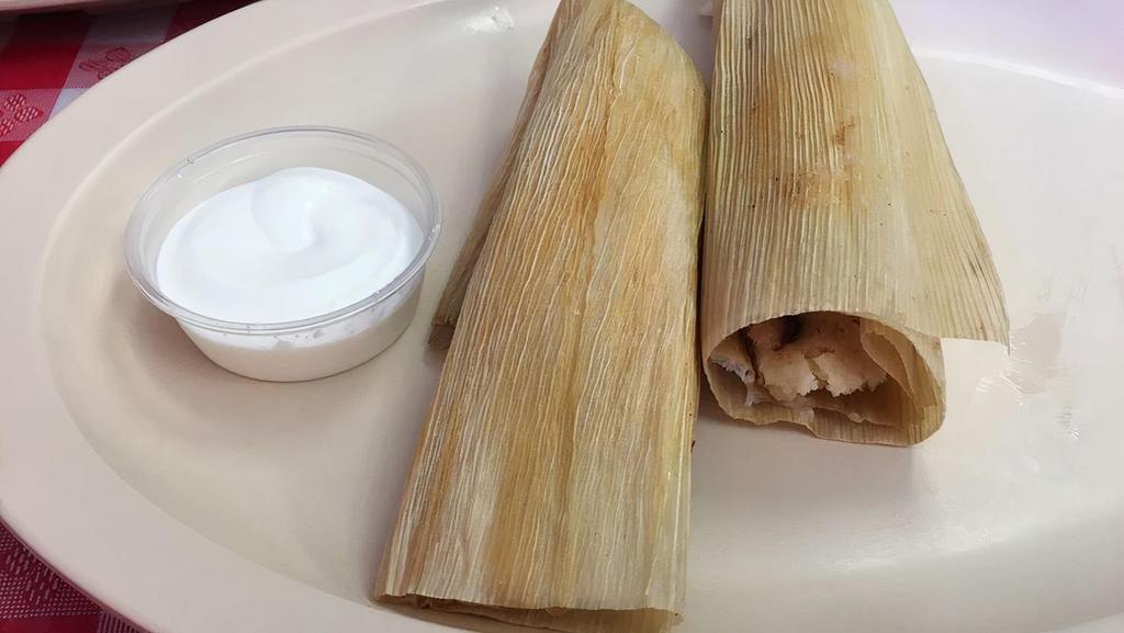 Tamales · 1 piece. Your choice of chicken, pork or pepper and cheese.