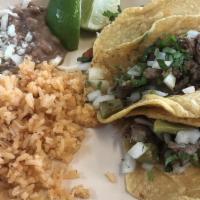 Taco Dinner · Three tacos with your choice of meat or vegetable, onions, lime, and cilantro. Flour tortill...