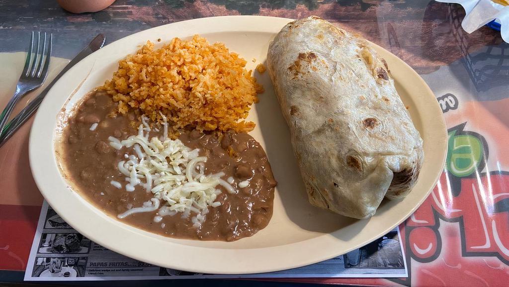 Burrito Dinner · Extra large flour tortilla, stuffed with rice, beans, your choice of meat, or vegetable, lettuce, tomato, cheese and sour cream. Served with rice and beans.