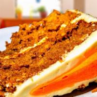 Carrot Cake · Creamy carrot cake, raisins, nuts, pineapple and carrots.