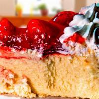 Strawberry Cheesecake · Creamy cheesecake on a graham cracker crust topped with fresh strawberry sauce.