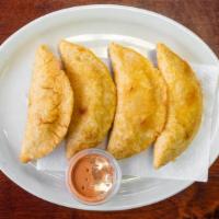 Shrimp Turnovers - Empanadas De Camaron · 4 Shrimp Corn turnover Nayarit style, deep-fried and filled with shrimp, and sided with our ...