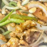 Chicken Fajitas · Served with rice, refried beans, and guacamole.