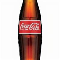 Mexican Coke · Glass bottled Coca Cola made with real sugar cane