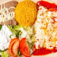 Enchiladas Dinner · 3 rolled tortillas dipped in red or green sauce, stuffed with your choice of meat and topped...