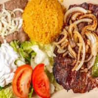 Carne Asada Dinner · Grilled skirt steak, served with lettuce, tomatoes, sour cream, guacamole, and tortillas. Se...