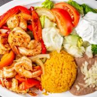 Fajitas Dinner · Grilled onion, green pepper, tomatoes. Choice of steak, chicken, or shrimp, served with lett...