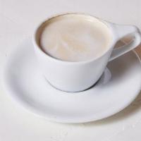 Chai Latte · House blend of tea, spices, and honey, with steamed milk and cinnamon.