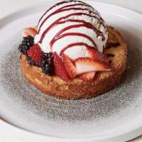 Butter Cake · Scoop of ice cream, blackberry sauce, berries