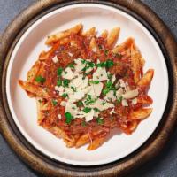 Meatballs Smash Pasta (Penne) · Fresh penne and homemade ground beef meatballs served with rossa (red) sauce, red pepper fla...