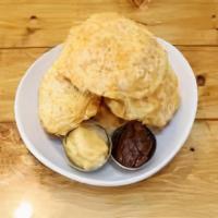 Basket O' Biscuits · Fluffy biscuits served with homemade jam and warm apple butter or honey butter. Great for sh...