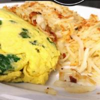 Spinach And Feta Omelet · We use fresh spinach with the finest imported Greek feta cheese.