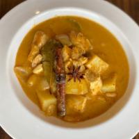 Massaman Curry · Rich, hearty curry served with potatoes, onion, peanuts.